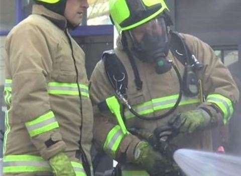 Firefighters used breathing apparatus to enter the home. Stock image