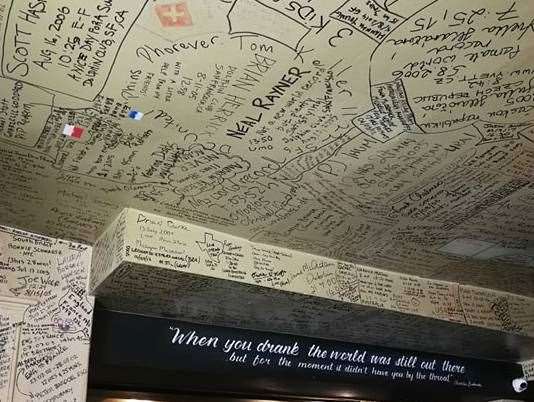 The White Horse walls are covered from head to toe in signatures and finish times