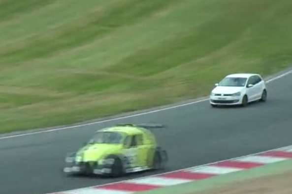 The white VW Polo gate-crashed the race at Brands Hatch