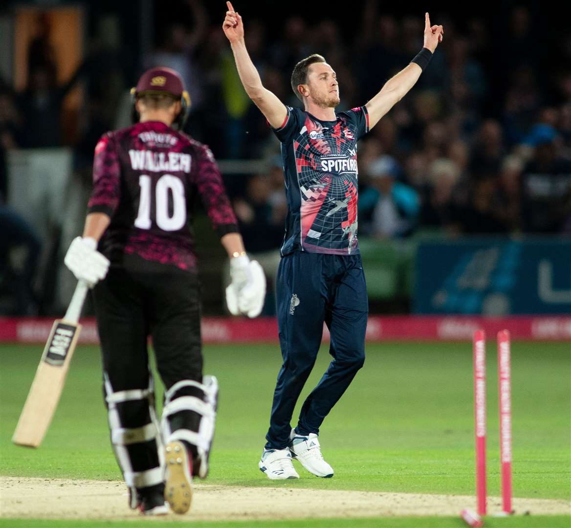Adam Milne celebrates taking the wicket of Somerset's Max Waller this summer Picture: Ady Kerry