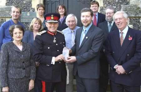 The Lord Lieutenant of Kent, Allan Willett, makes the presentation to Simon Dolby. Picture: GERRY WHITTAKER