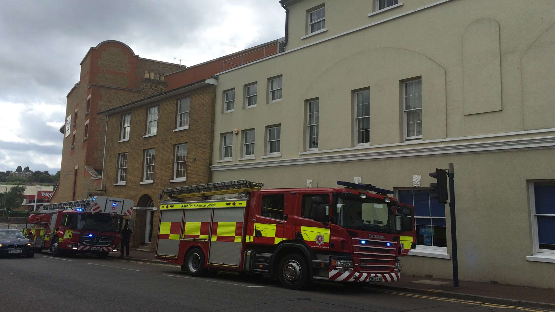 Fire crews in Earl Street after reports a young boy had climbed a building at Fremlin Walk