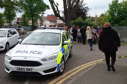 Parents being held outside Holy Trinity school in Gravesend after a bomb scare. Picture: Aisha Newcombe