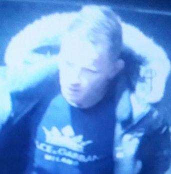 A CCTV still was released following reports of a suspect brandishing a weapon