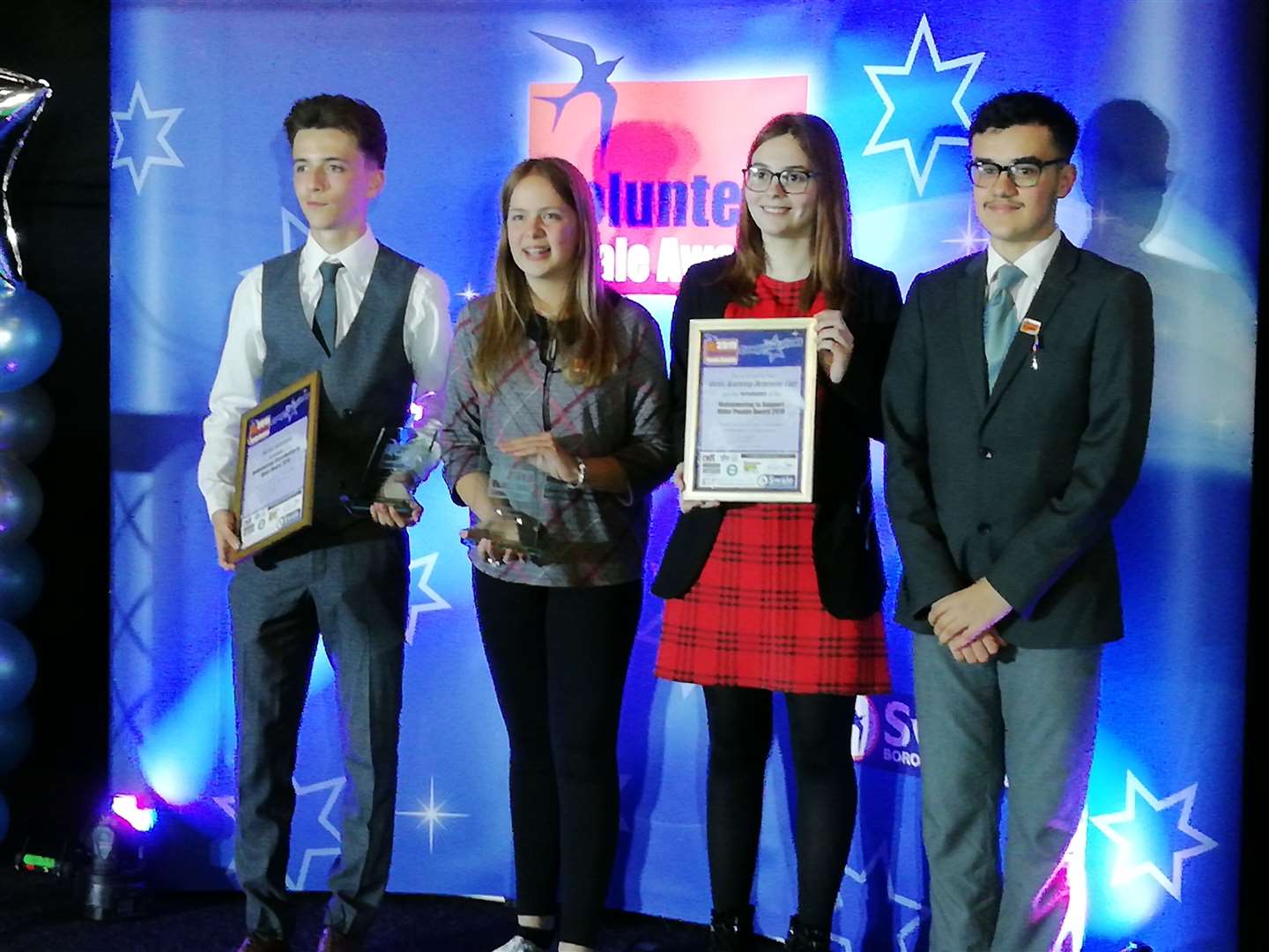 Emre Huseyin, right, with fellow Oasis Isle of Sheppey Academy winners Michael Santangelo, Lucy Brightman-Stokes and Sinead Hubbard at the Swale Volunteer Awards