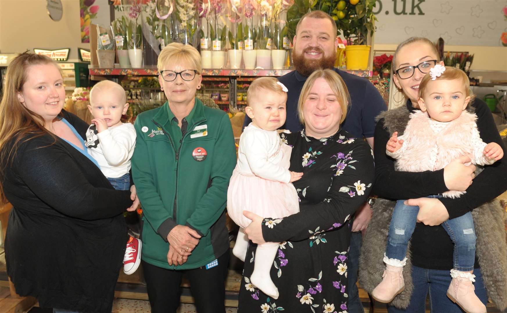Last year's Cute Kids winners, their mums and Morrisons staff. Picture: Steve Crispe 5639501