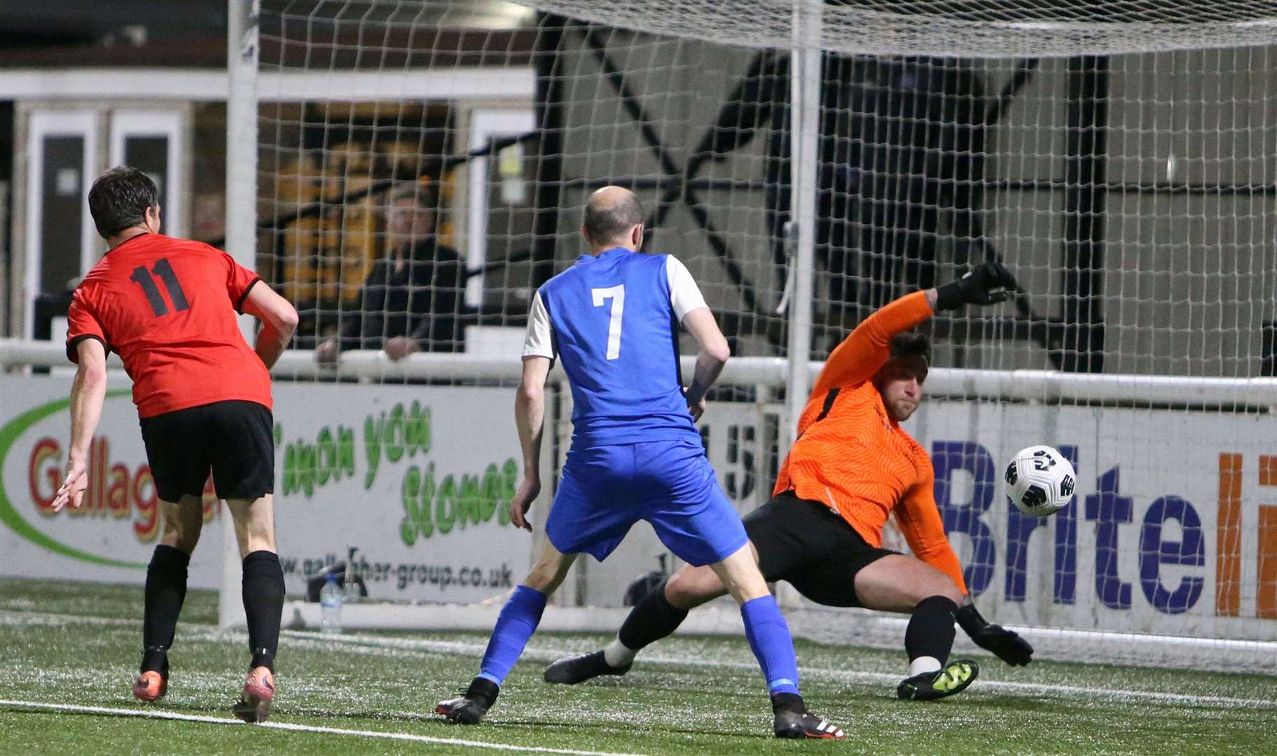 Goalmouth action from the DFDS Kent Veterans Cup Final on Friday night. Picture: PSP Images