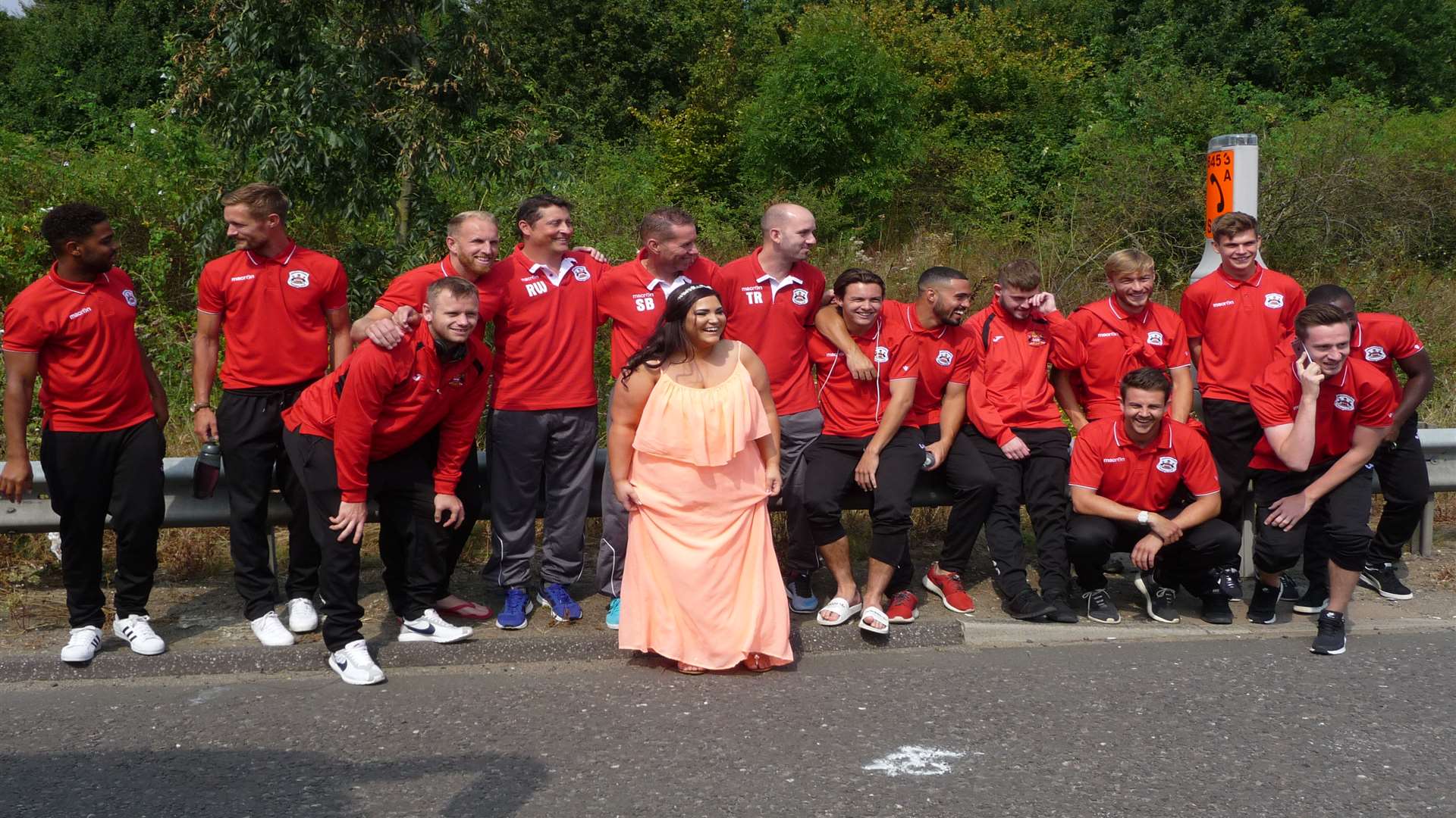Bride-to-be Lisa Cobbold poses with the players. Picture: Needham Market FC