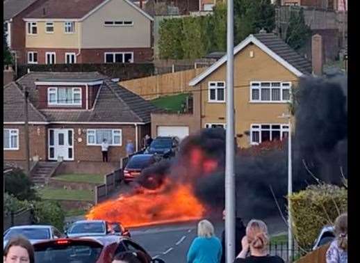 A man has been treated for a suspected broken leg after a car crashed into a wall and set alight in Prince Charles Avenue in Walderslade. Photo: Trevor Carnell (55906848)