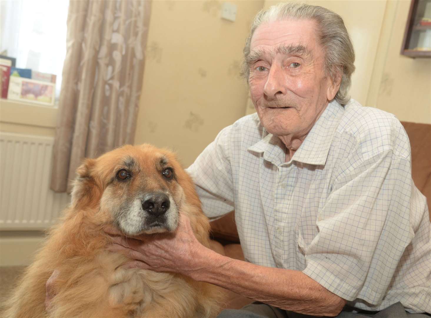 Raymond Burden and his dog Max. Picture: Chris Davey