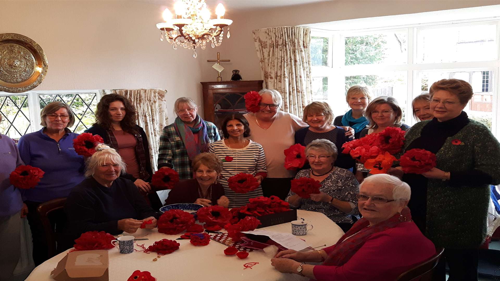 The DVD will show Masheeda Downing and her friends making and sorting through the poppies