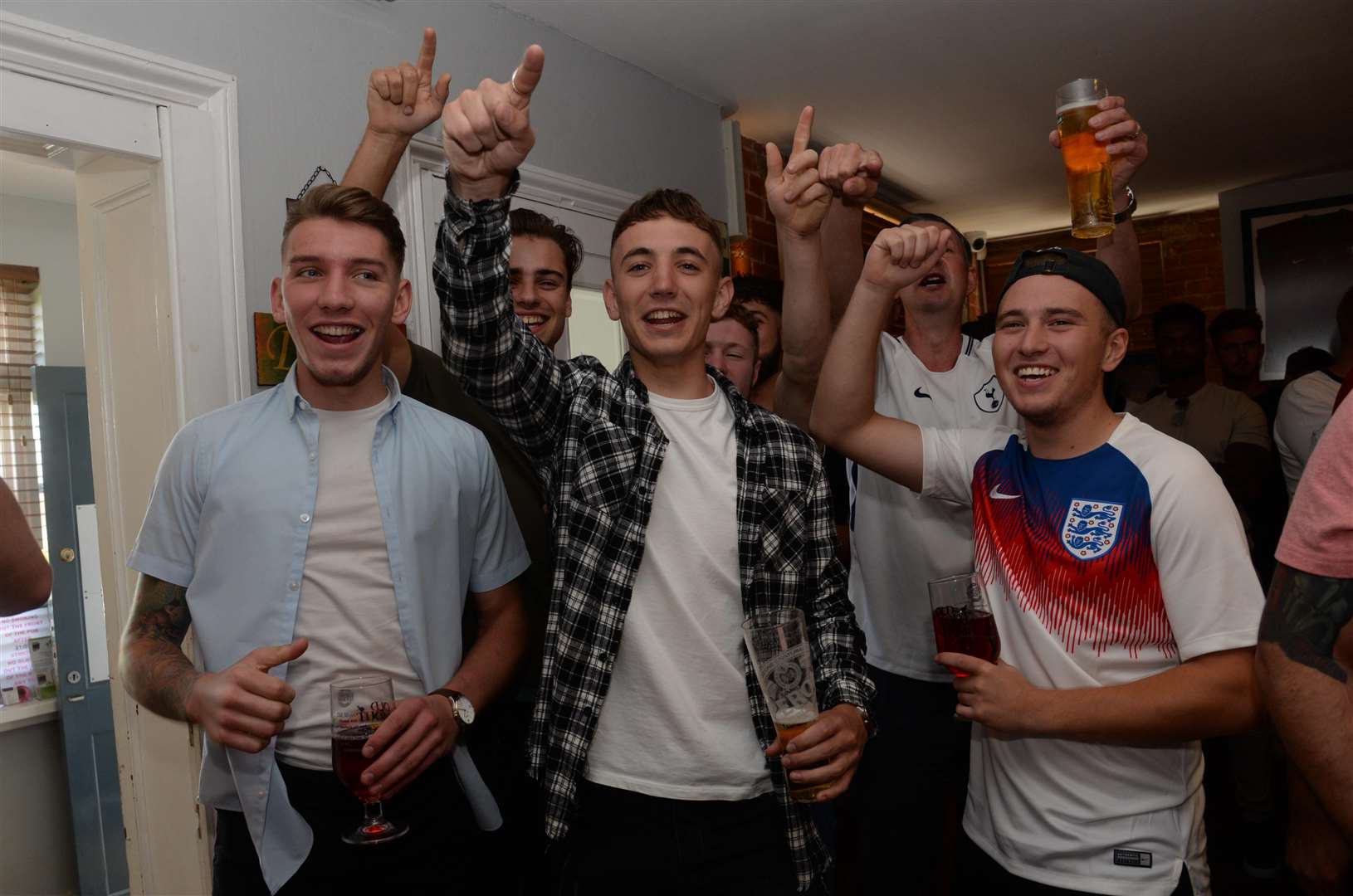 Football fans watching the second England World Cup match at The Local, Chartham on Sunday
