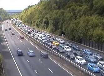 Three lanes of the carriageway have been blocked and queues are building