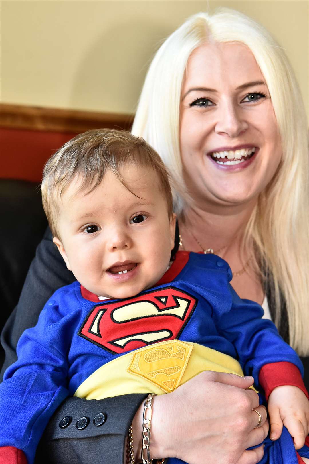 Mum Melanie Sharman with little Harrison who was born with only half a functioning heart