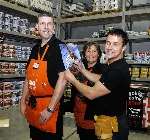 Craig Phillips (right) signs autographs for the staff at the new B&Q store at Whitfield, Dover.