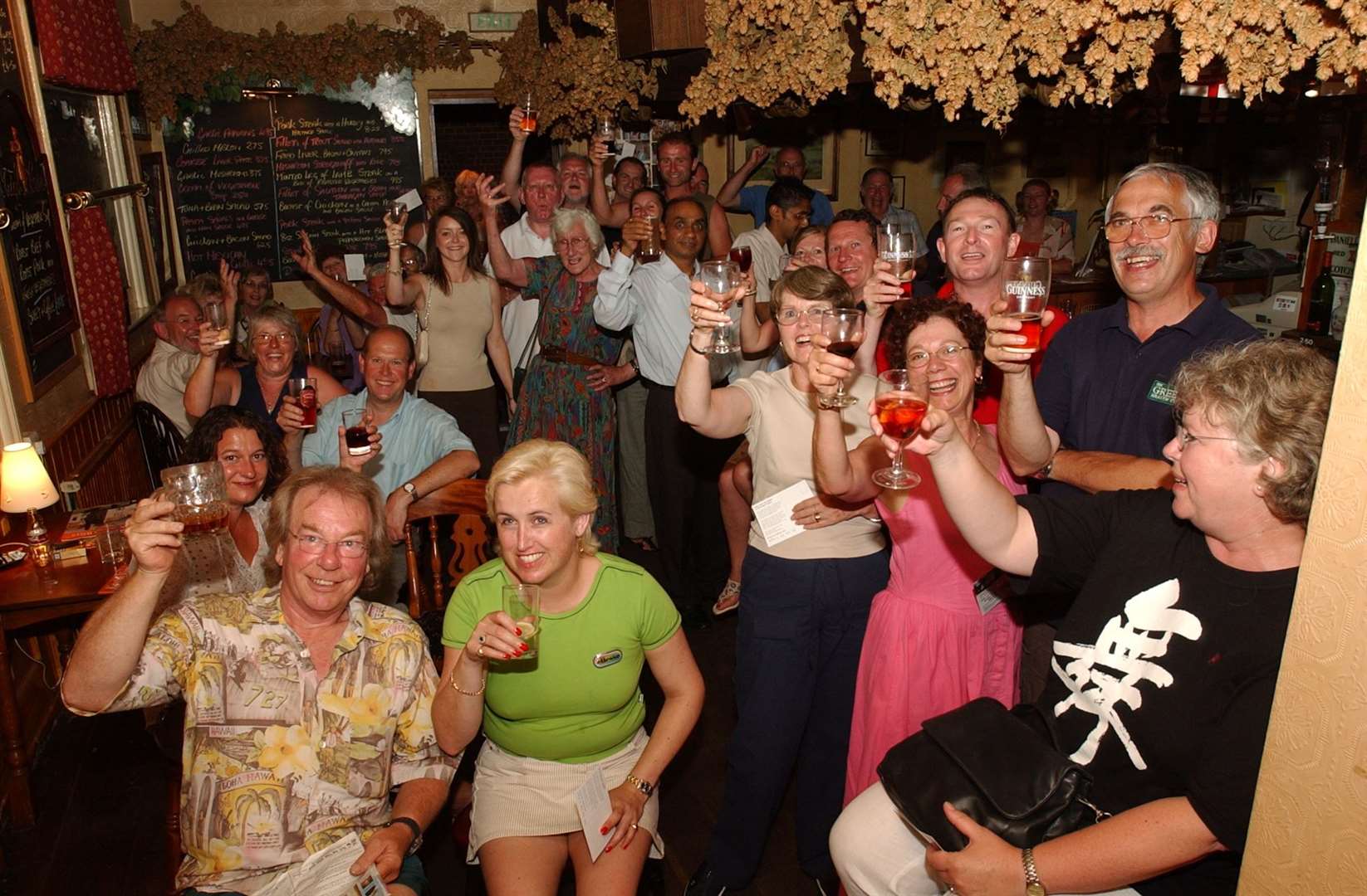 Villagers in the Royal Oak in Charing in August 2004. Sadly, it closed in 2016. Picture: Matt McArdle
