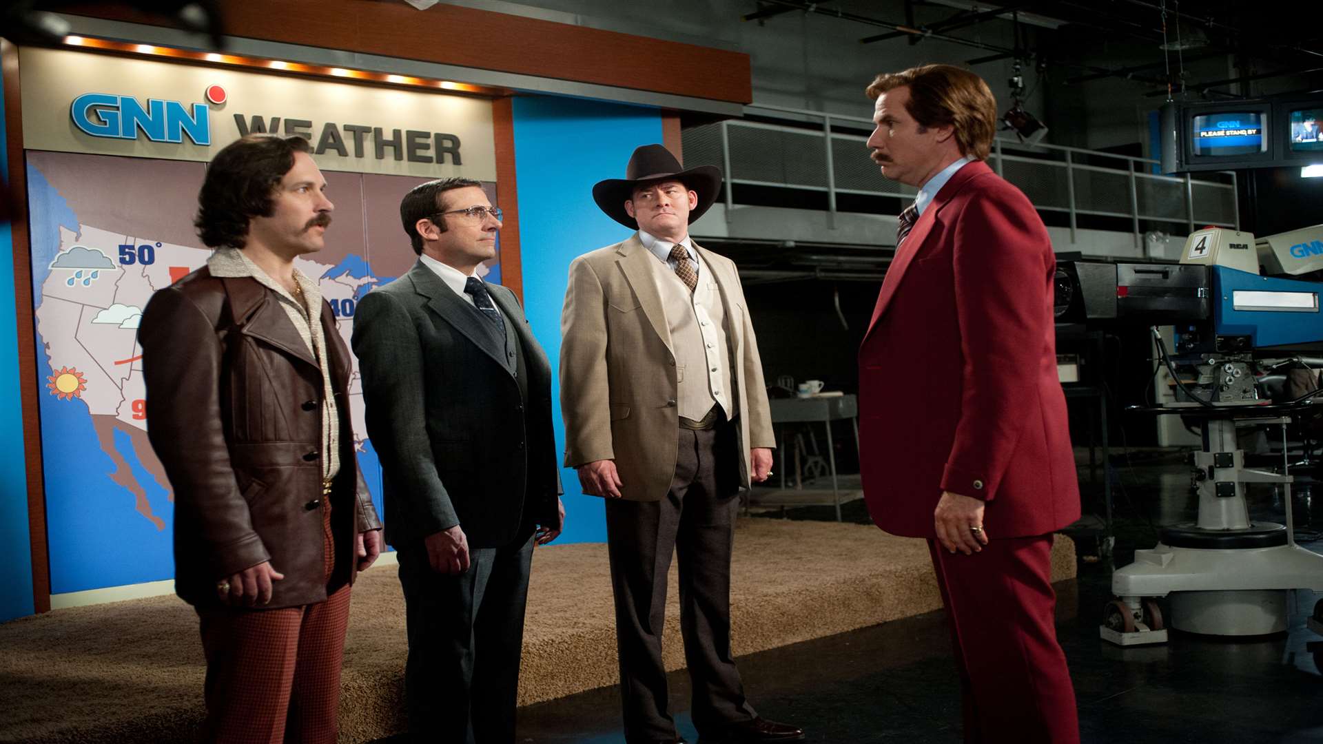 (l-r) Paul Rudd as Brian Fantana, Steve Carell as Brick Tamland, David Koechner as Champ Kind and Will Ferrell as Ron Burgundy, in Anchorman 2: The Legend Continues. Picture: PA Photo/Paramount Pictures Corporation
