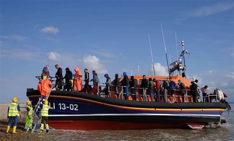 A group of people thought to be migrants are brought in to Dungeness. Image: Gareth Fuller/PA