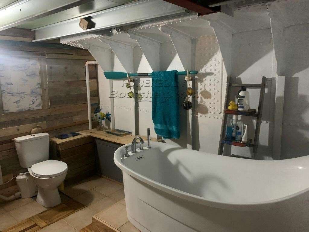 A sumptuous bathroom located inside the barge. Photo: RightMove/ Boatshed Medway