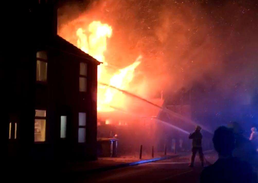 Crews tackle the raging fire in Canterbury Road, Faversham. Pic: Ioan Saul