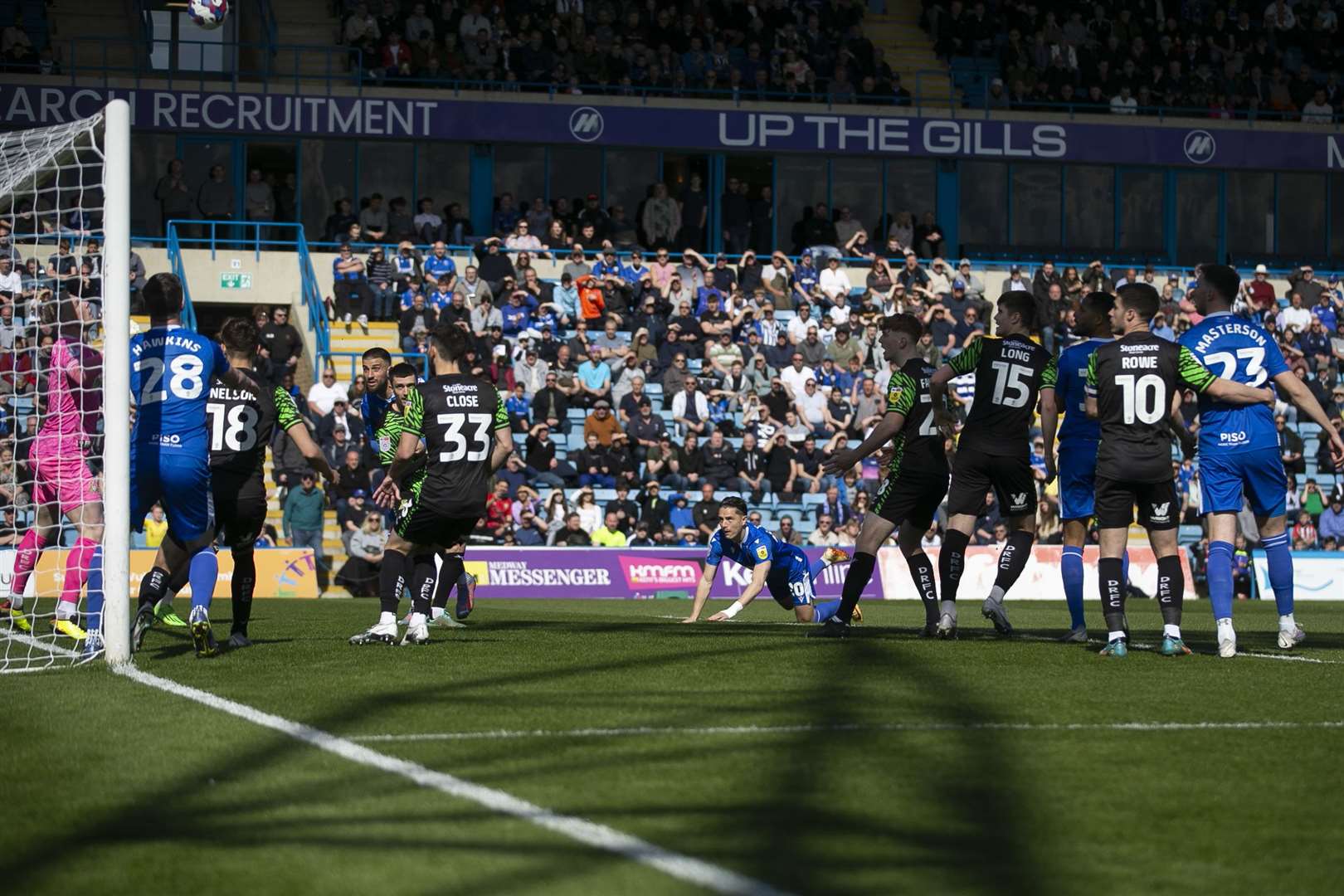 Tom Nichols' volley hits the back of the net for Gillingham against Doncaster