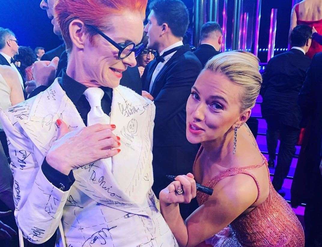 Sandy Powell covered her suit with signatures from celebrities to sell and raise money for Prospect Cottage. Photo: Sandy Powell