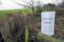 Save our fields poster