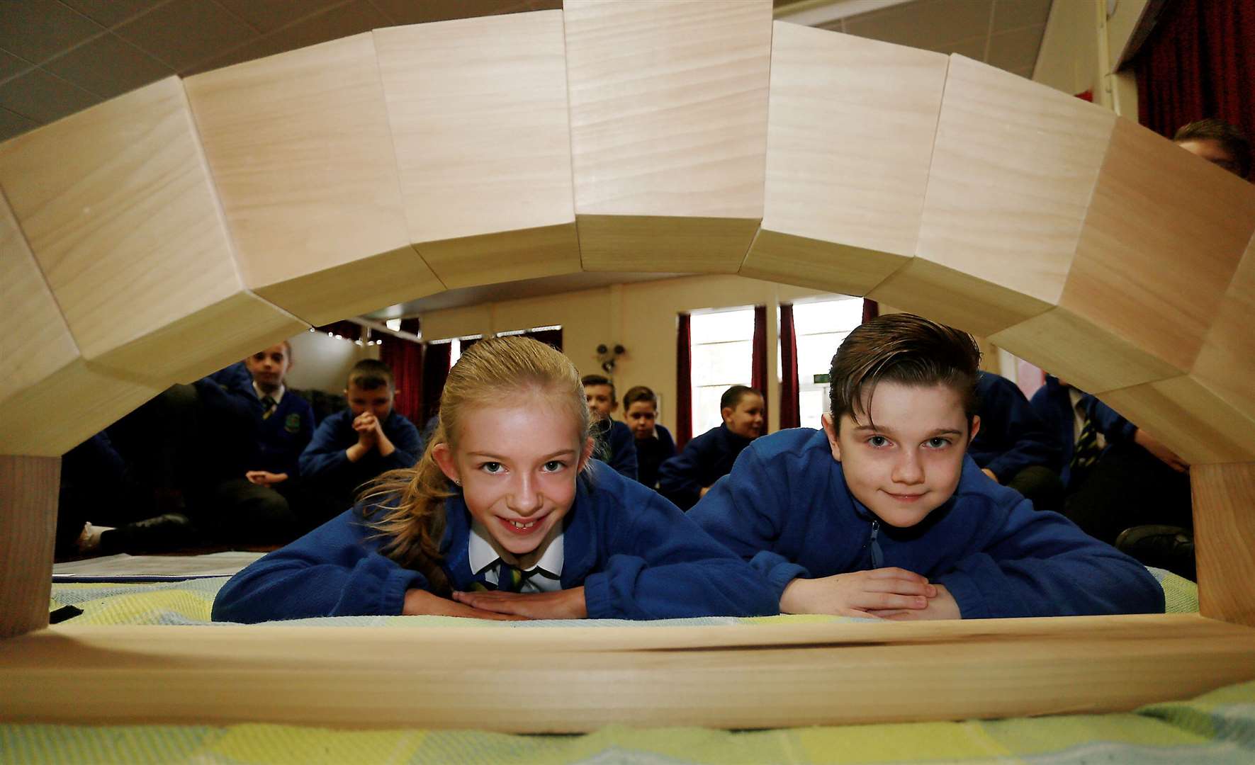 Two pupils proudly posing with their finished design. Picture: Phil Lee