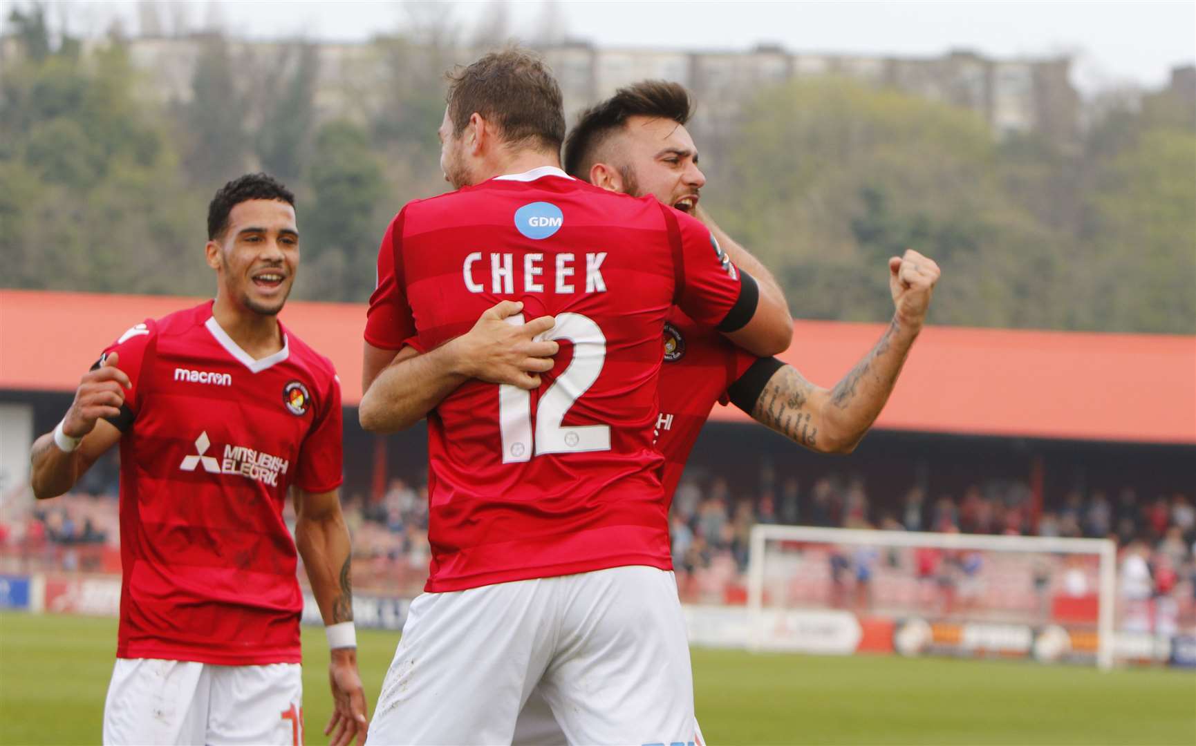 Michael Cheek celebrates his first goal with Jack Payne and Corey Whitely Picture: Andy Jones