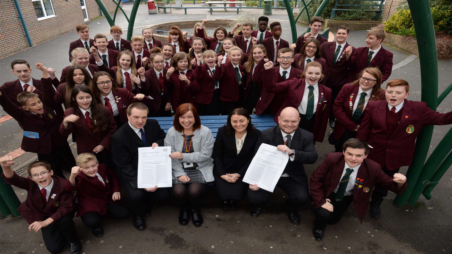 Deputy heads Peter Southall, Yvette Peden and Matt Lewis with assistant head Jackie Noble, second from left and the school ambassadors celebrating the good Ofsted report