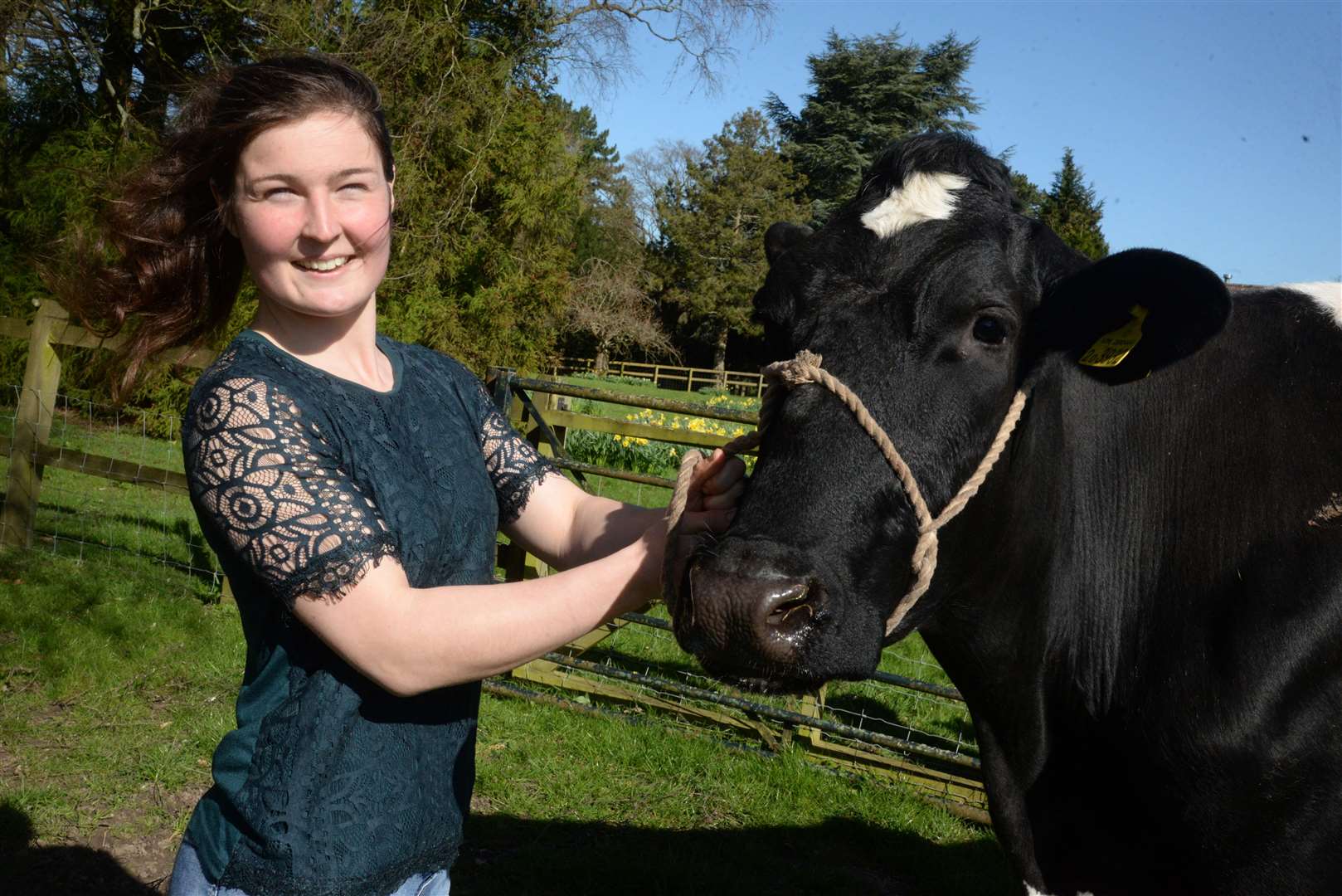 Holly Dyer with Barbera, one of her cows at Ben and Holly's Little Dairy in Harrietsham. Picture: Chris Davey. (32107903)