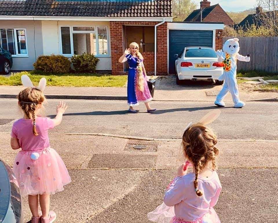 Youngsters got dressed up to wave to the passing princess and bunny