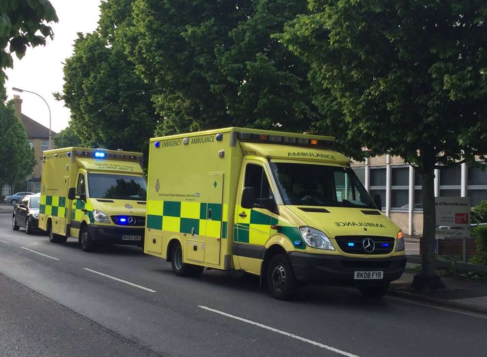 Two ambulances parked outside Sittingbourne police station