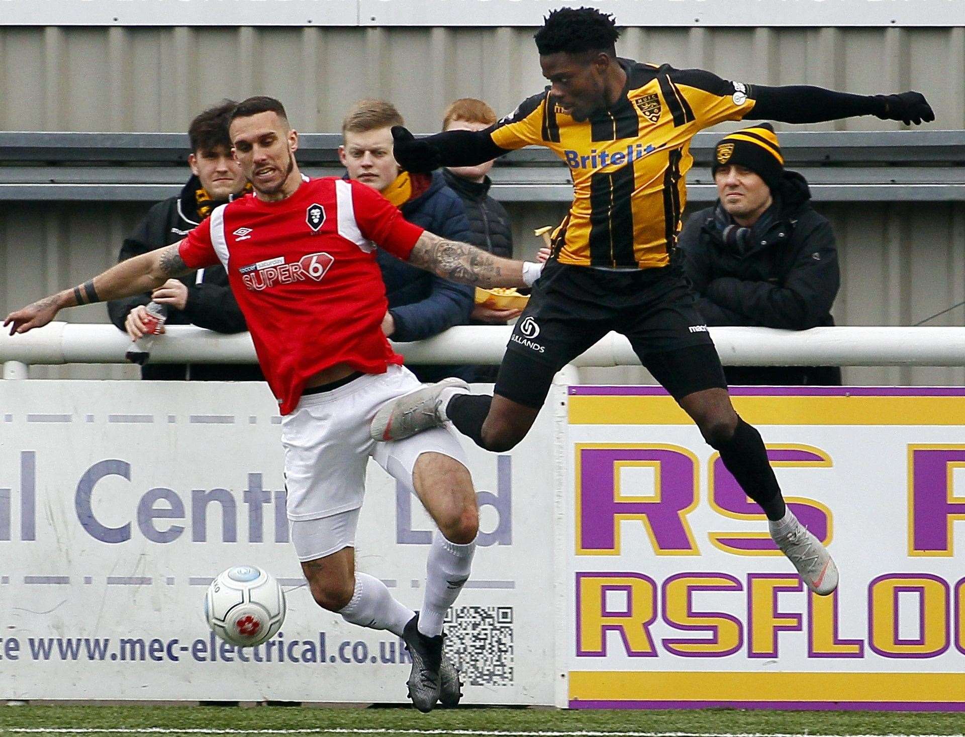 Action from Maidstone's 2-0 defeat by Salford as Justin Amaluzor, a key man for next season, gets stuck in Picture: Sean Aidan