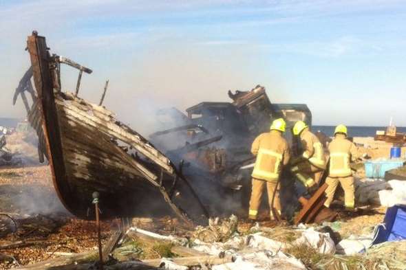 Firefighters at the scene of the boat fire at Lydd-on-Sea. Picture: Kent 999s.