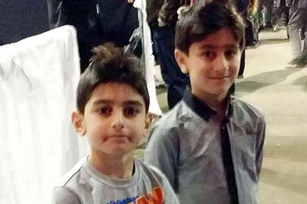 Tragic Alin Mosa, pictured right, with his younger brother Ara. Rossparry.co.uk/SWNS.com