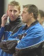 TROUBLED TIMES: Iwan Roberts and Darren Hare discuss tactics. Picture: GRANT FALVEY