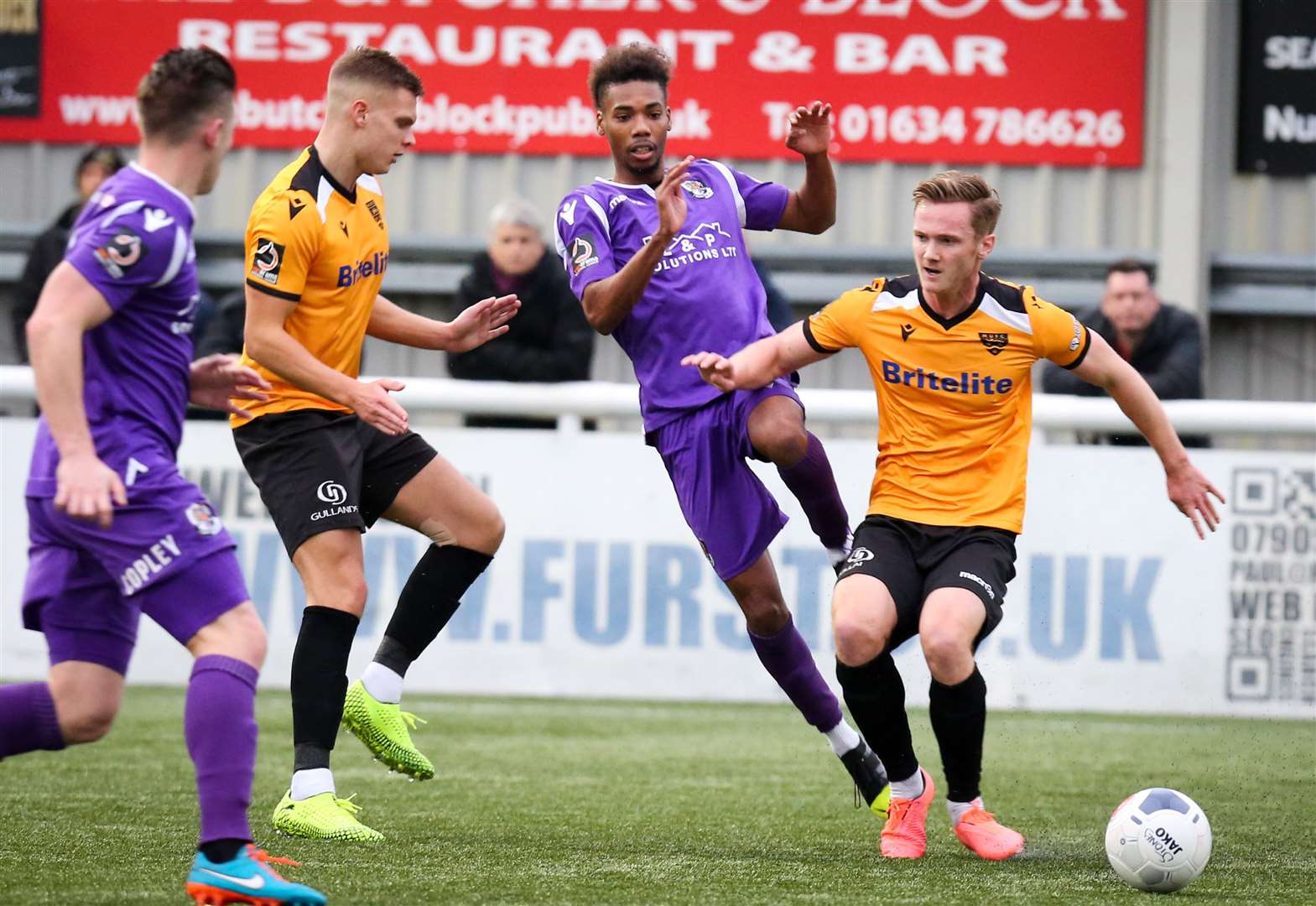 Maidstone midfielder Cameron James plots his next move with Ross Marshall close by Picture: Matthew Walker
