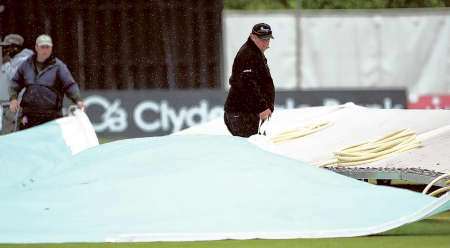 The covers go on at the Nevill Ground