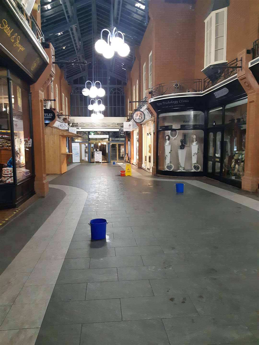Buckets were placed in Royal Star Arcade to catch the water seeping through the roof
