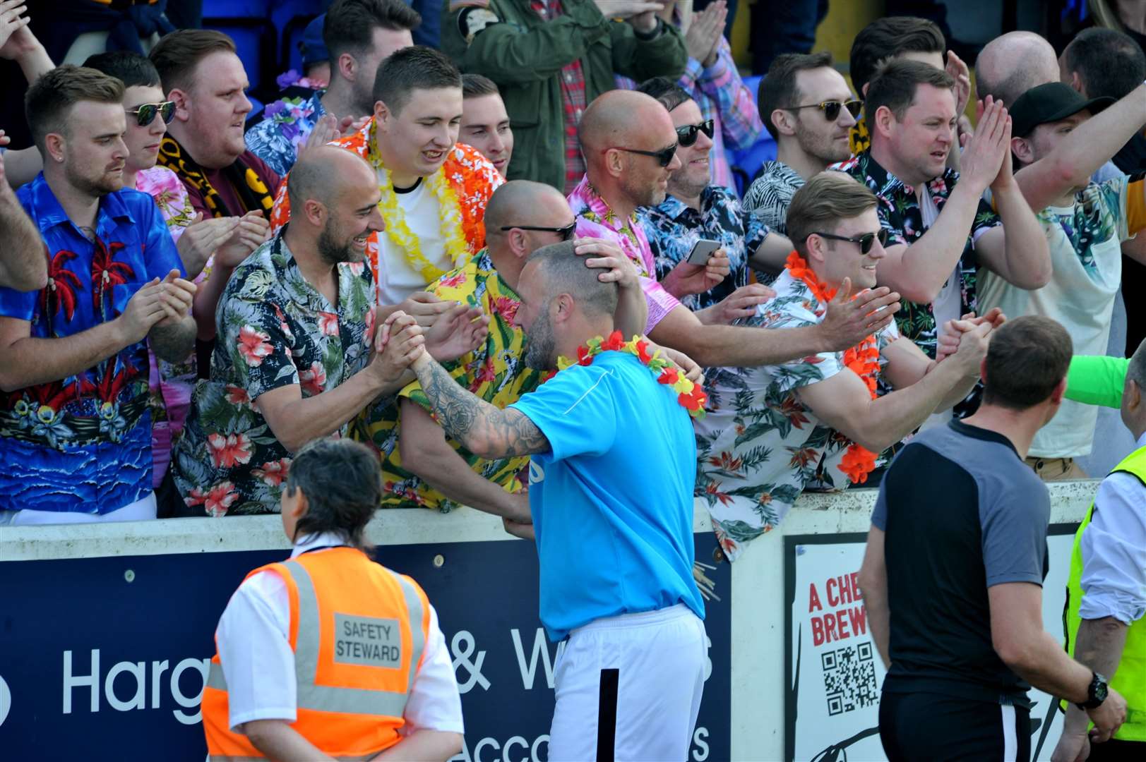 Jay Saunders celebrates with Maidstone fans at Chester last weekend Picture: Steve Terrell