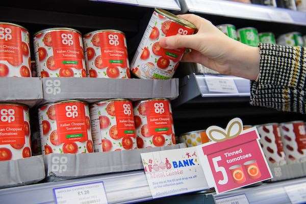Co-op stores taking part in the reverse advent calendar concept include labels on shelves with suggested gifts