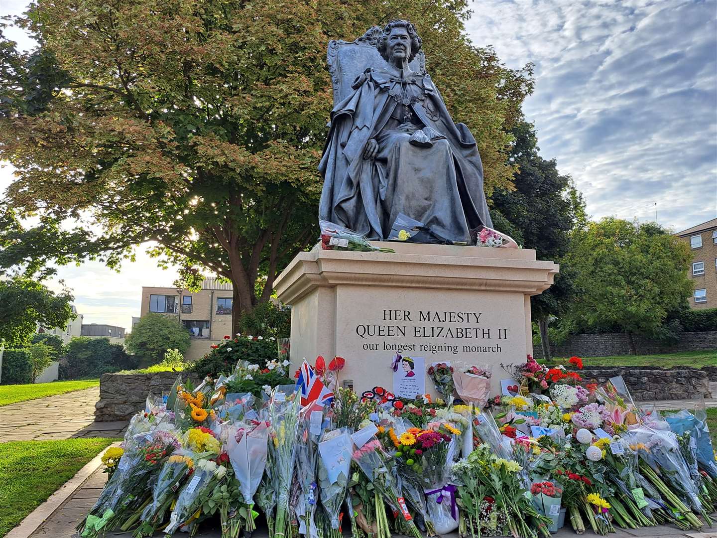 Flowers at the Queen Elizabeth II statue on Monday, September 12