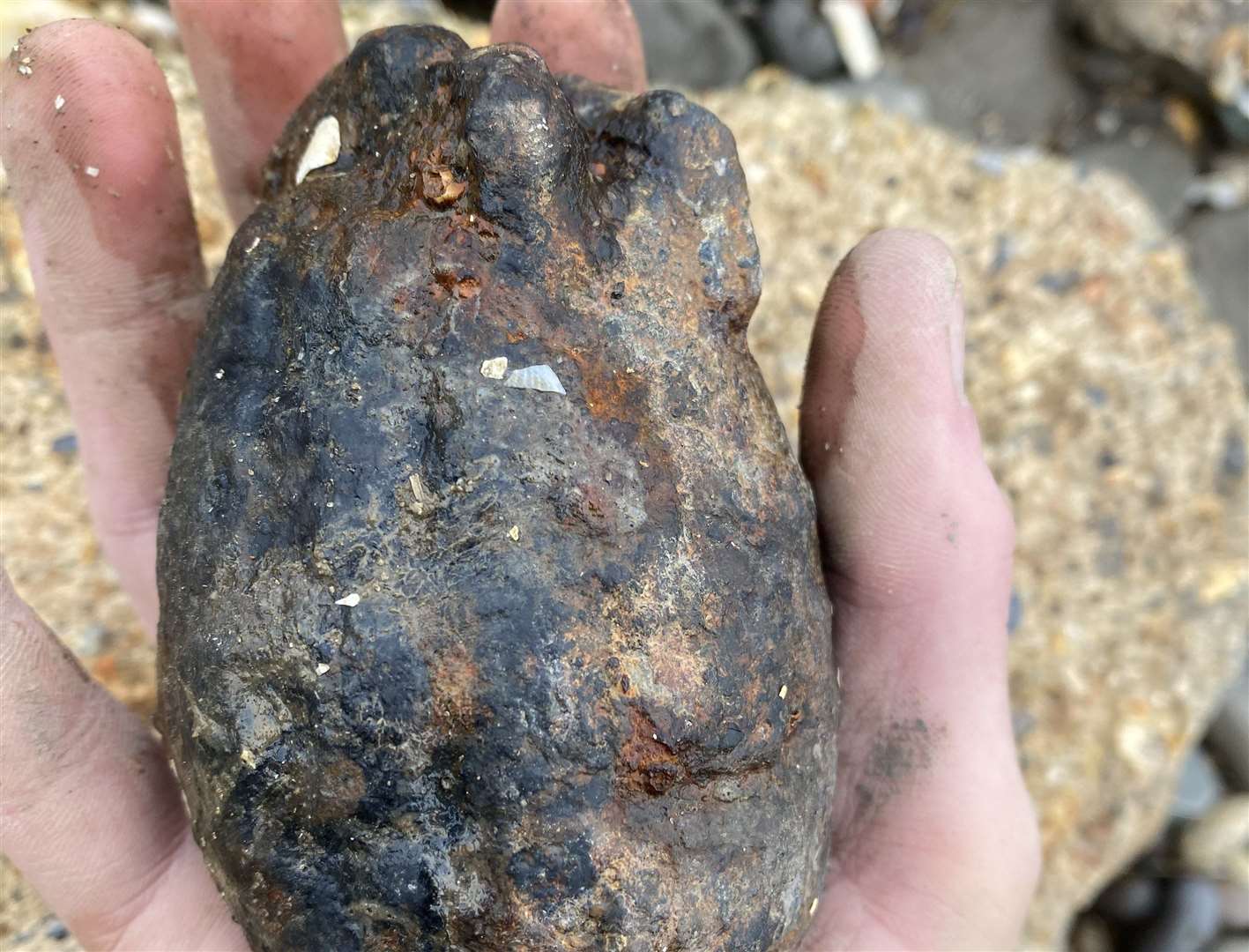 Bomb squad officers blew up this old hand-grenade found on the beach. Picture: Cameron Carron