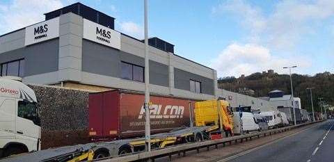 Lorries are stacked on Dover's streets, making deliveries of food to M&S difficult