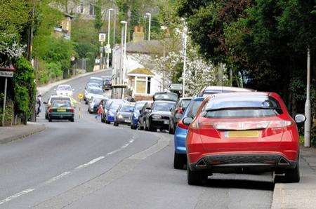The number of parked cars add to the problems of safety for the nearby Minster Primary School