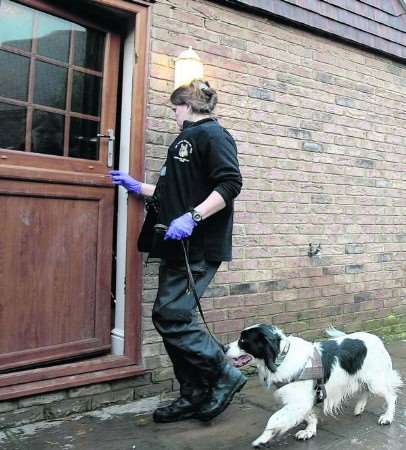 A house is searched during the early morning raids