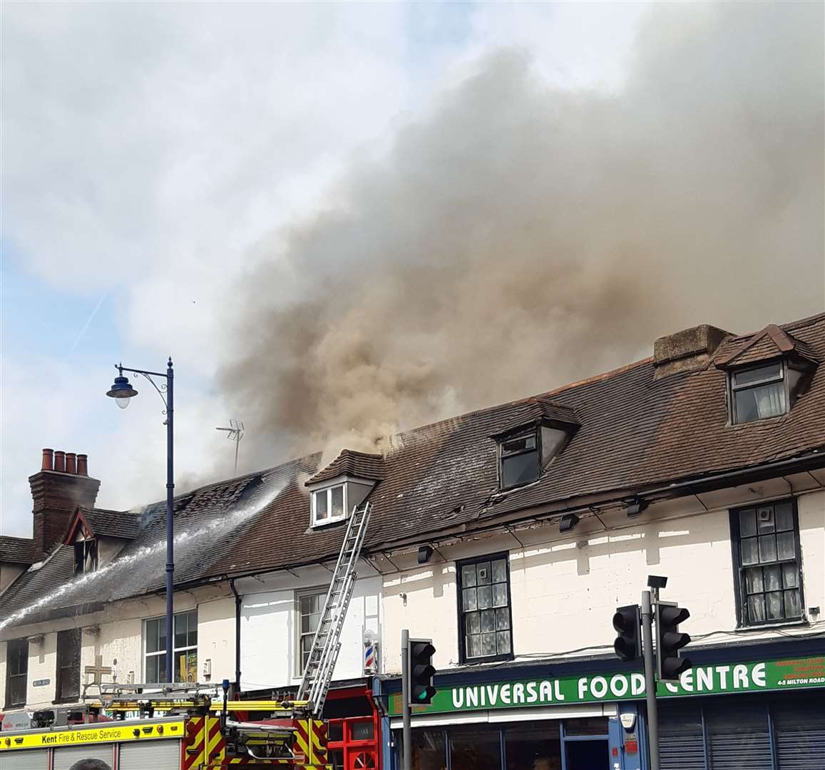 Smoke was billowing out the roof. Picture: Mandy Yates