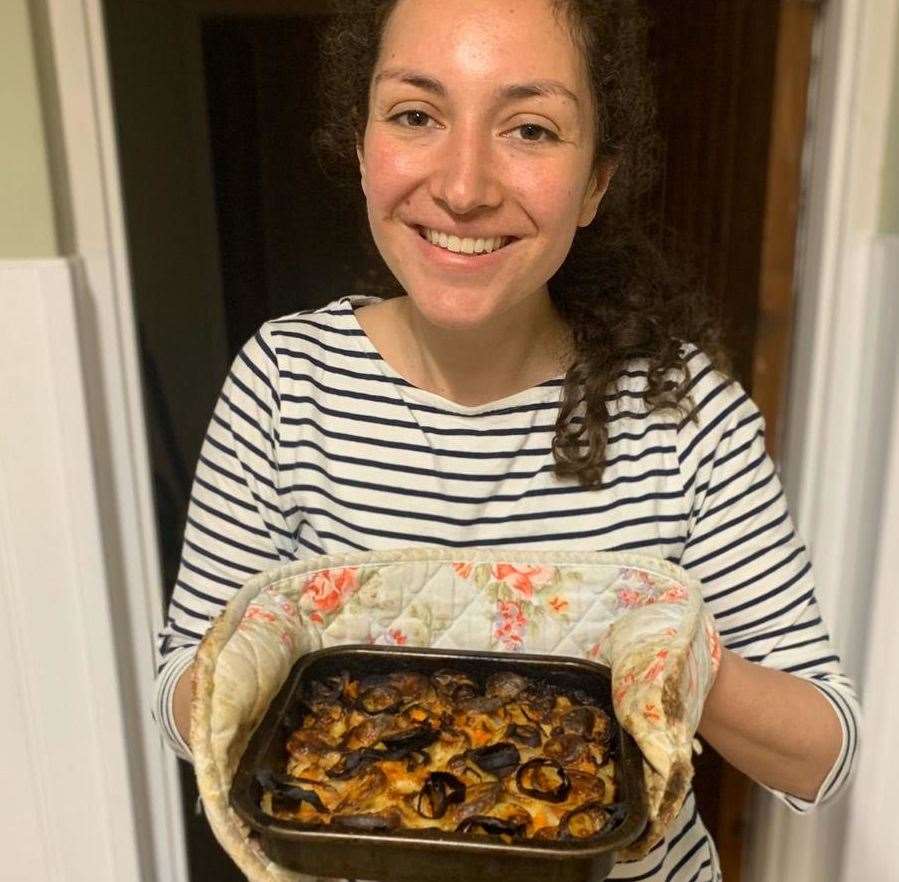 Reporter Katie Heslop with her (slighly burnt) potato Jane, a wartime recipe used in the 1940s