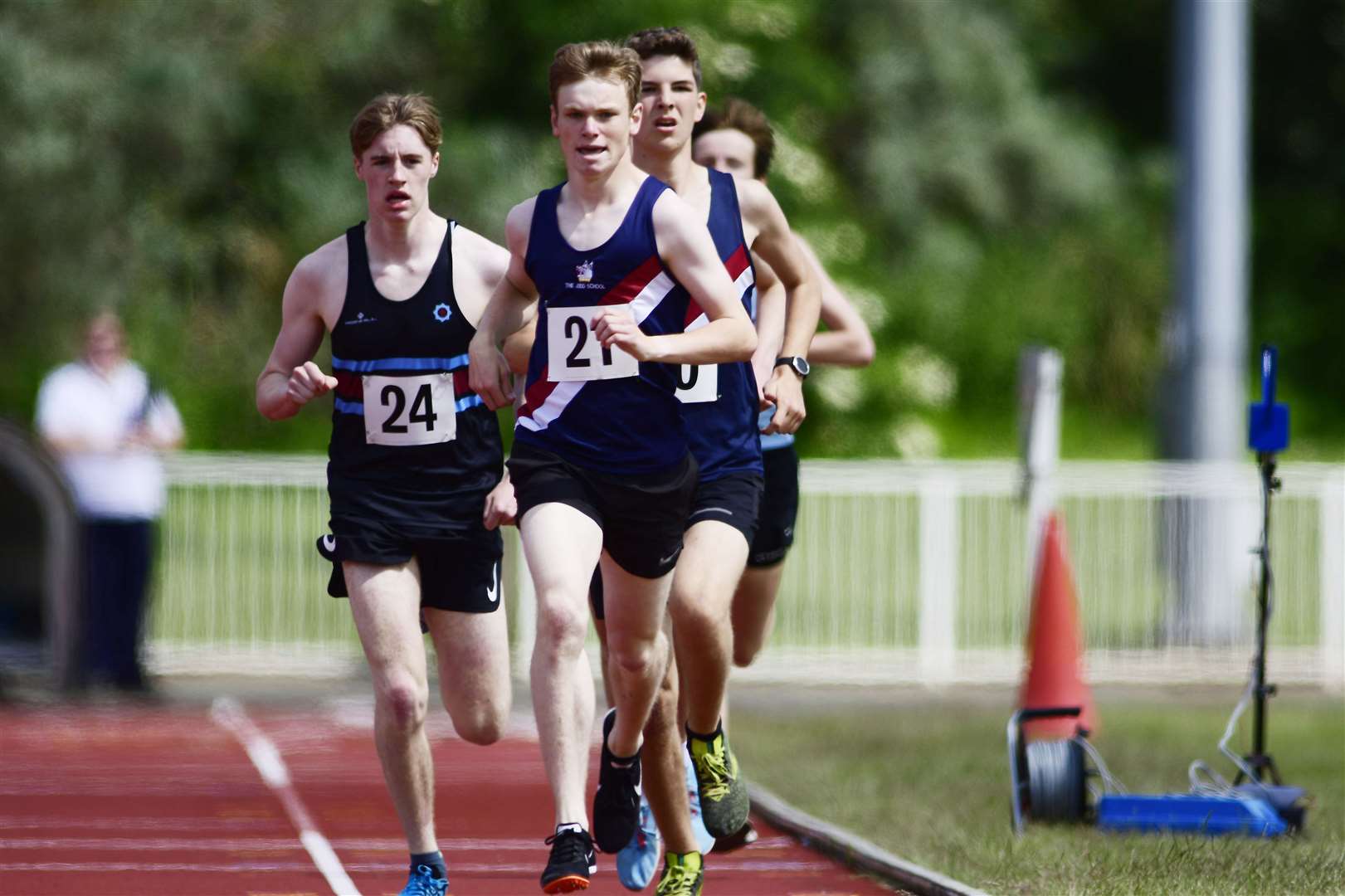 Tonbridge's Adam Singleterry (21) leads the way in the 800m Picture: Barry Goodwin
